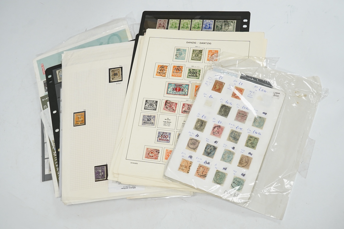 A collection of stamp albums, unmounted stamps and empty stock sheets, including a Victorian stamp album edited by Richard Senf, containing a selection of mid 19th century stamps, including an incomplete run of plated pe